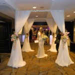 White 4 Post Canopy created by SBD Event Designs, Sheer Fabric with Flowers